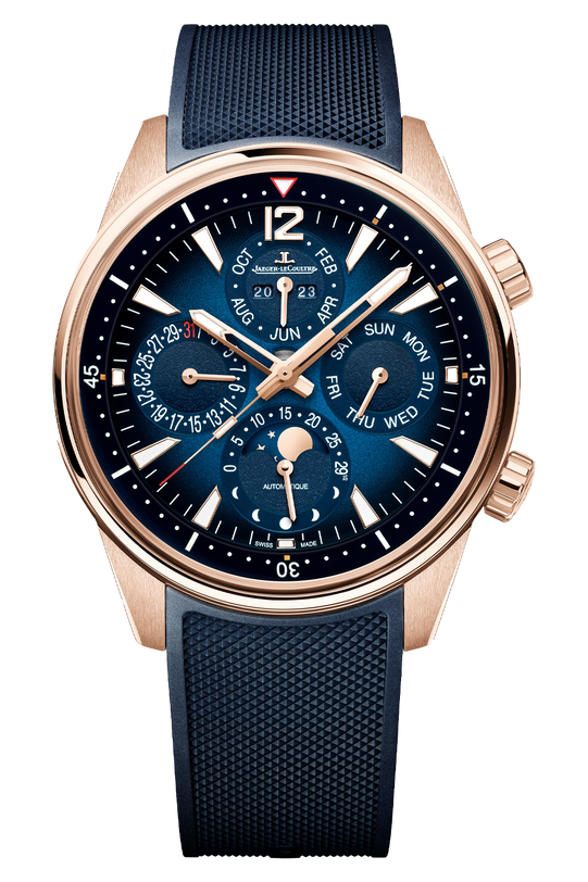 The Jaeger-LeCoultre Polaris Perpetual Calendar is a luxury pink gold watch with a blue dial, perpetual calendar, moon phase sub-dials, textured blue strap, white markers, and gold-accented hands for an elegant look.