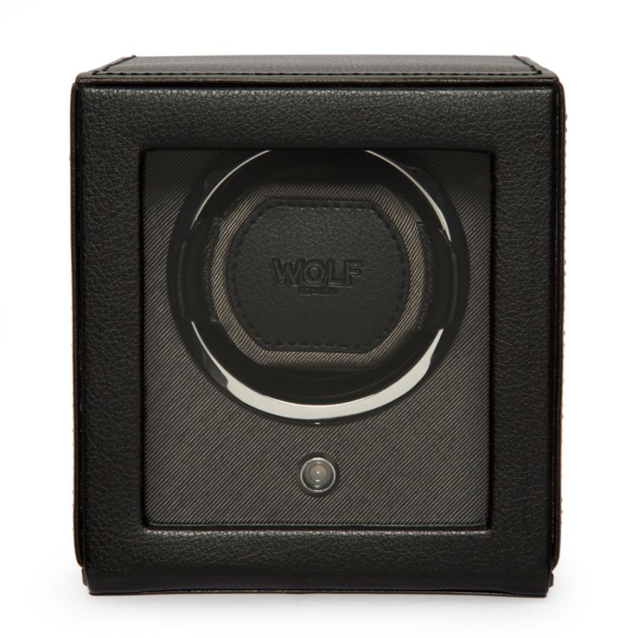 Black leather watch winder with single rotating cradle, Wolf branding, and power button on front face.