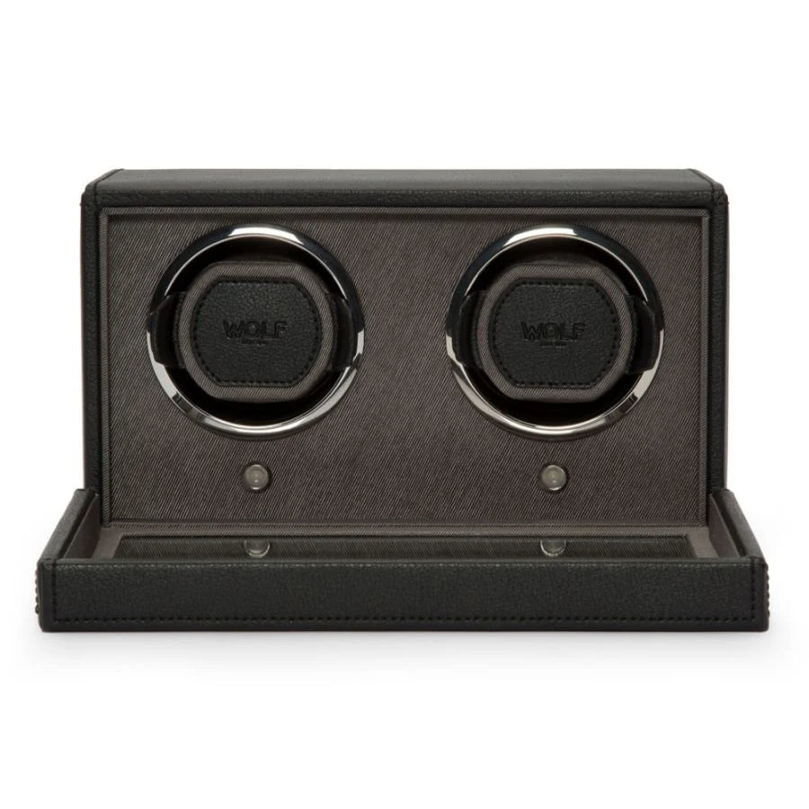 Black double watch winder with two circular watch holders and pull-out base drawer.
