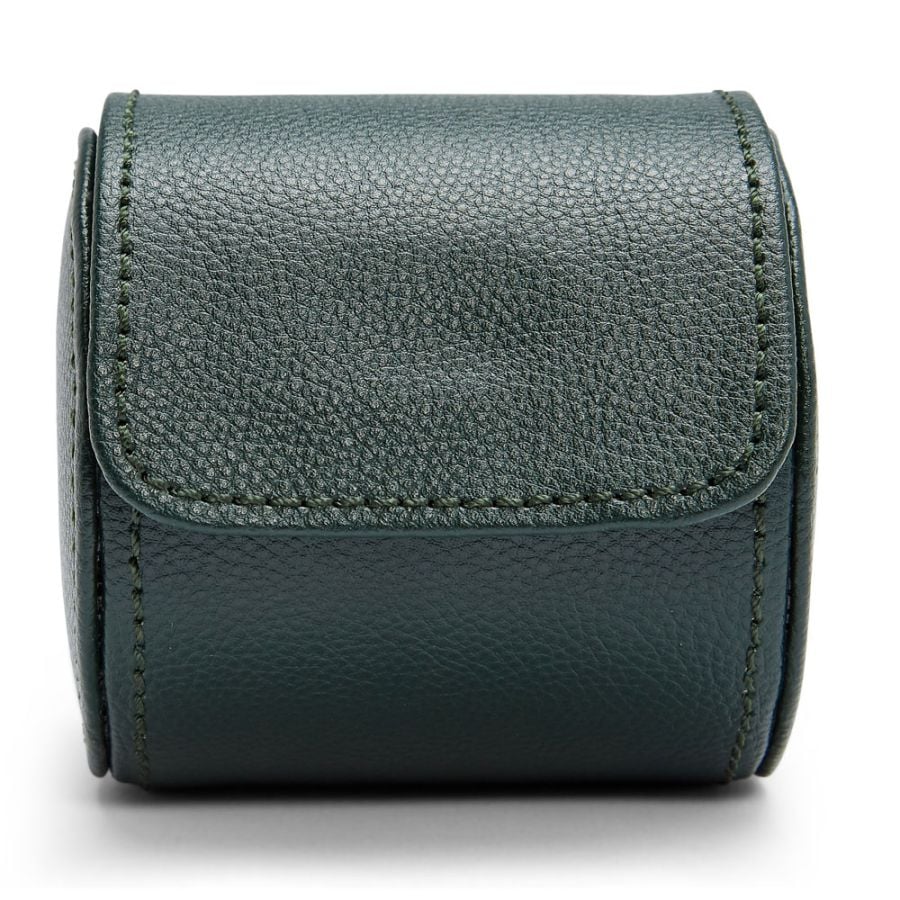 Green leather watch roll with snap closure and contrasting stitching detail.