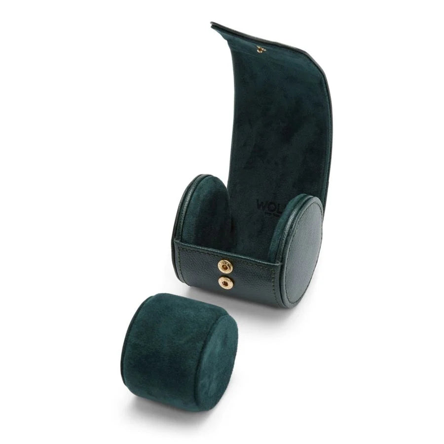 Dark green leather watch roll with gold snap closures and removable suede-lined cylinder for single watch storage.