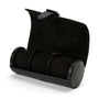 Black leather watch roll with three padded compartments and a magnetic closure strap.