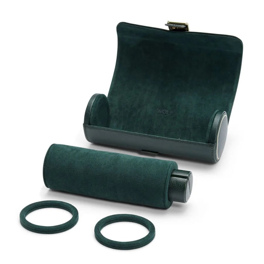 Dark green watch roll with metal clasp, cylindrical storage case, and two fabric rings for organizing timepieces.