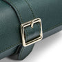 Dark teal leather watch roll with gold-tone square buckle closure and visible stitching detail.