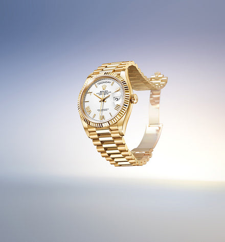 A gold wristwatch with a white face and Roman numerals is shown floating against a gradient background.