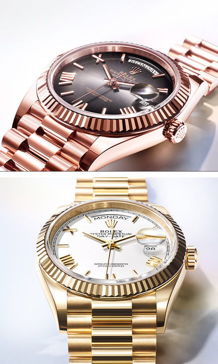Two luxury wristwatches, one rose gold with a dark dial, one yellow gold with a white dial, both with metal bands.