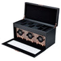 Black watch winder with three rotating mechanisms, mesh front panel, storage compartments in open lid, and lower storage draw