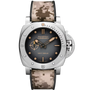 The Panerai Submersible QuarantaQuattro Navy SEALs is an automatic watch featuring a round black dial with beige markers and hands, set in a silver case with a camouflage fabric strap. It houses the P.900 calibre and offers a 3-day power reserve.